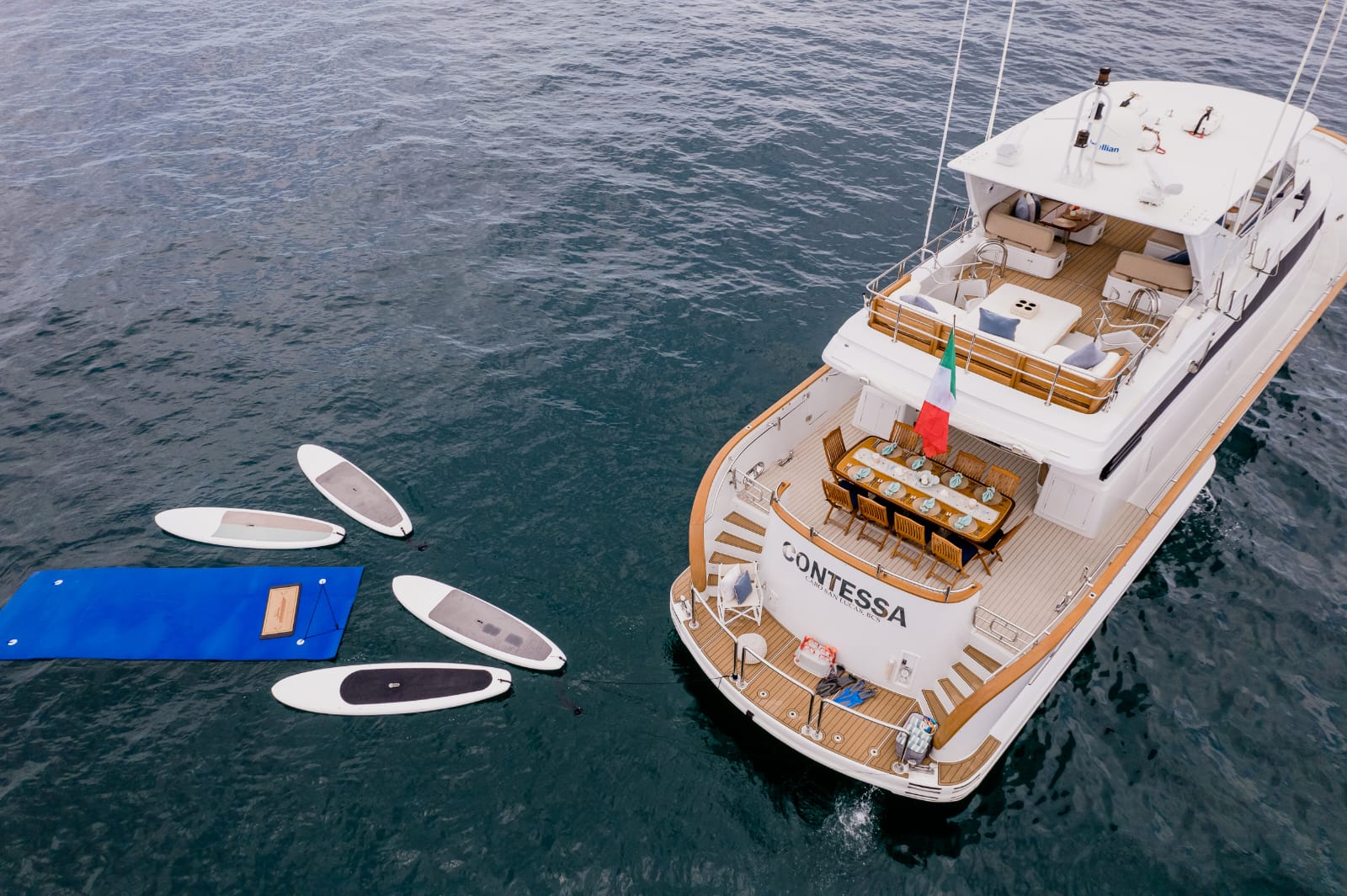 Aerial Stern View with 4 Stand-Up Paddleboards & Floating Island