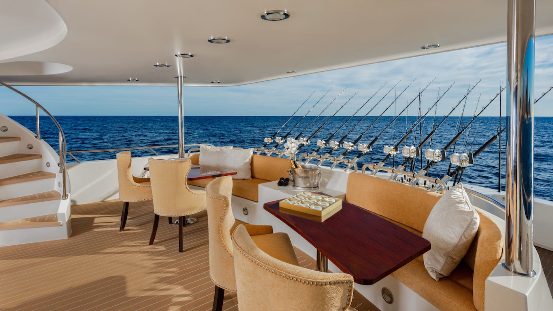 Shaded Aft Deck Dining & Lounge Next to the Sportfishing Cockpit